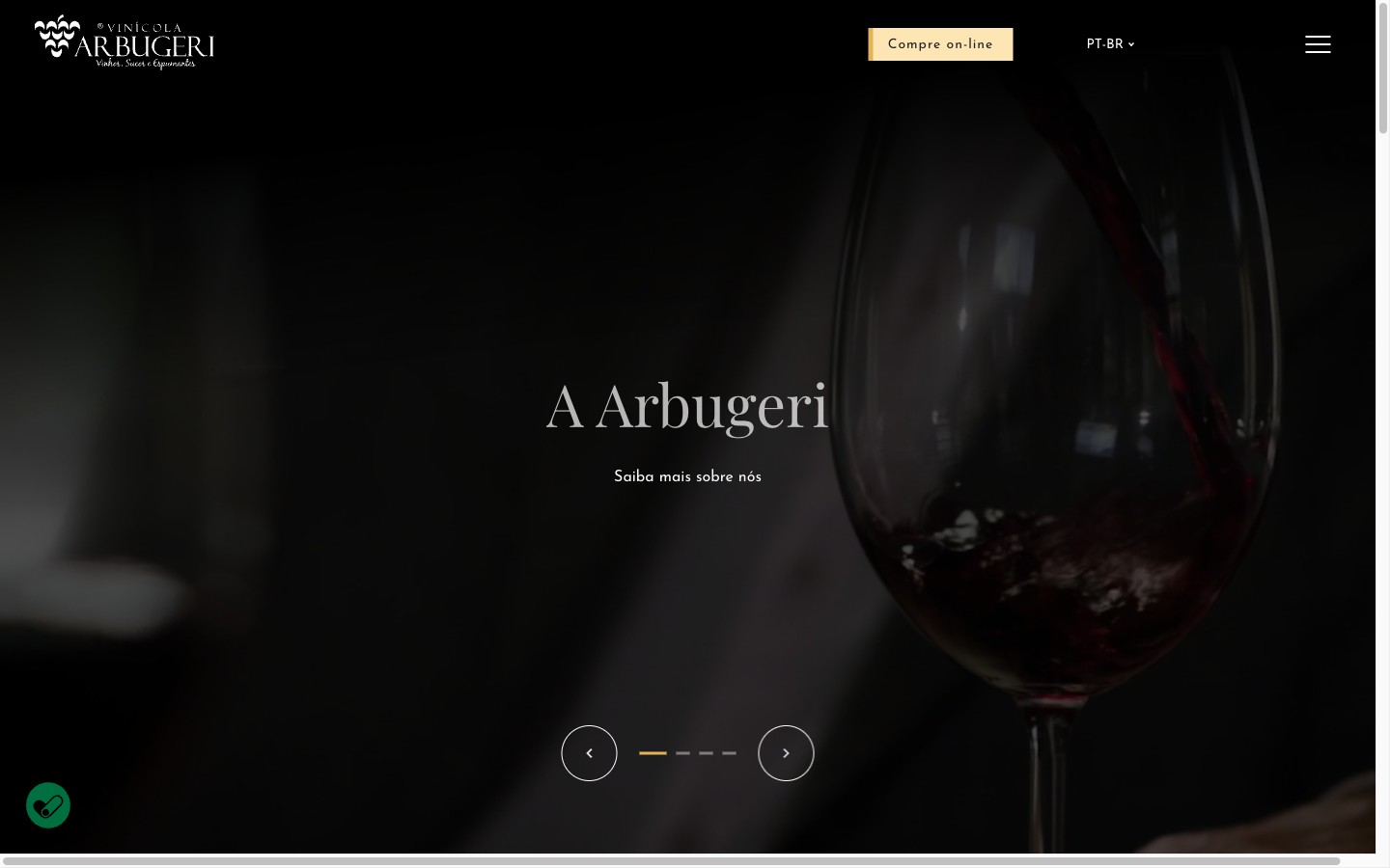 Homepage hero: a glass of red wine on a dark backdrop with the Vinícola Arbugeri brand and the A Arbugeri wordmark